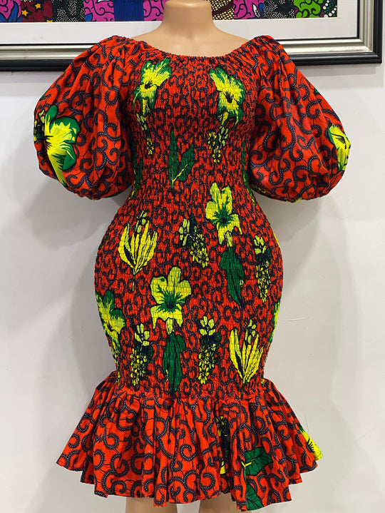 African print smoke body-con dress with puffy sleeves.