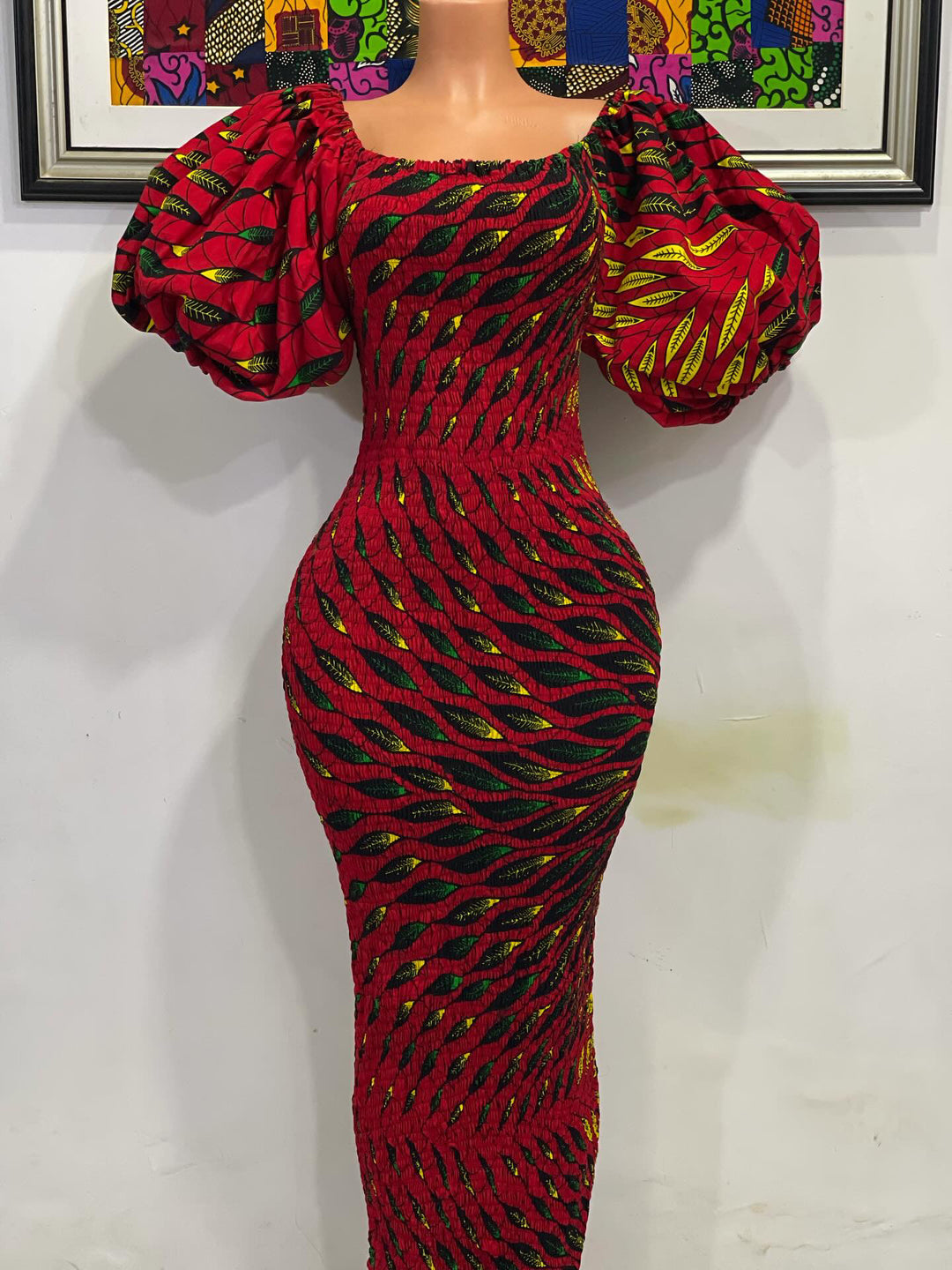 African print stretchy body-con dress with puffy sleeves.