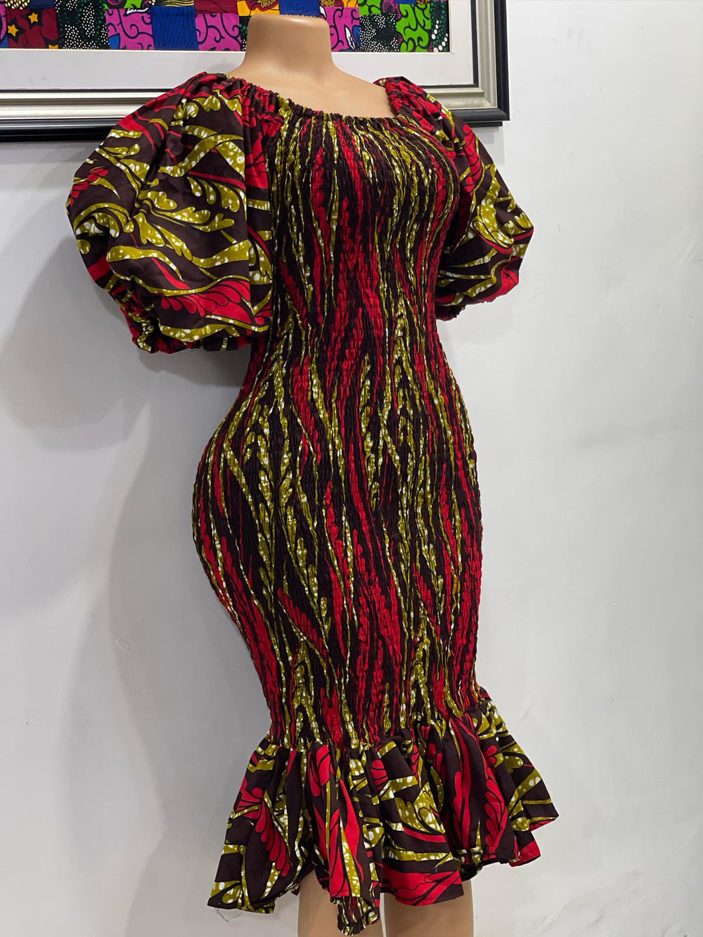 Short African print smoke dress with puff sleeves.