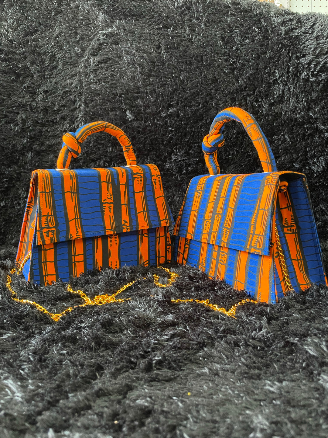 African print mini handbags.