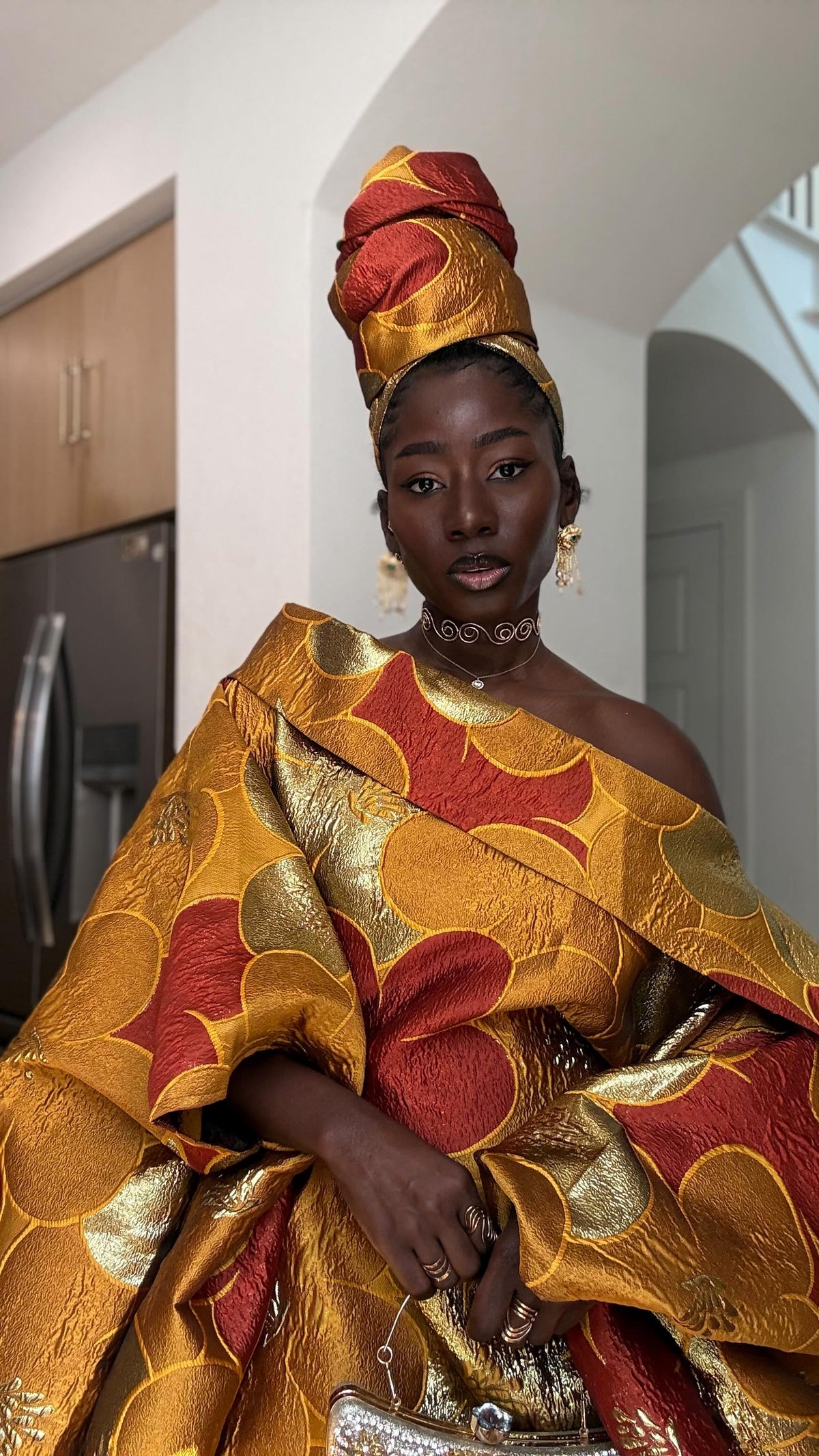 @kristline__ wearing K.D.KOLLECTIONS to an African event