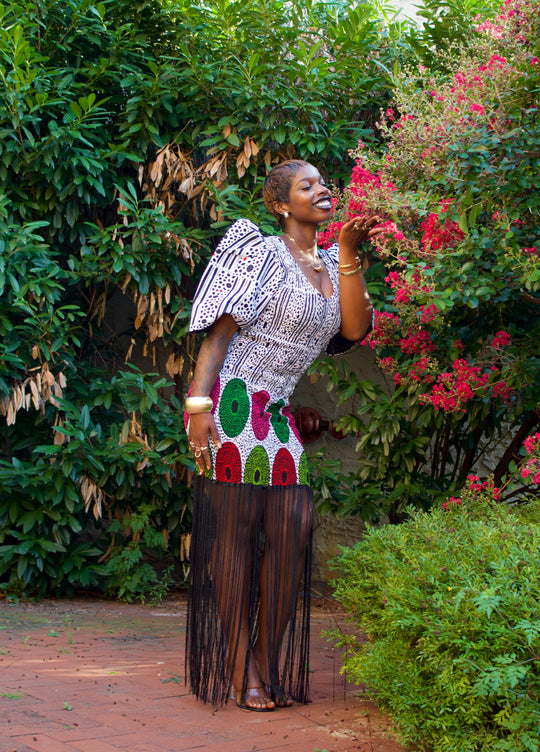 African print smoked bodycon dress with dripping fringe.