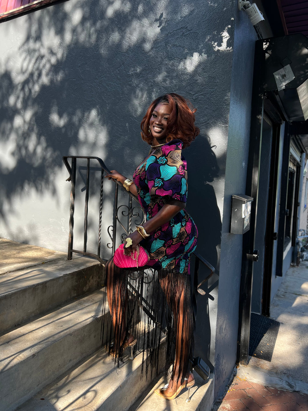 African print stretchy bodycon dress with dripping fringe.