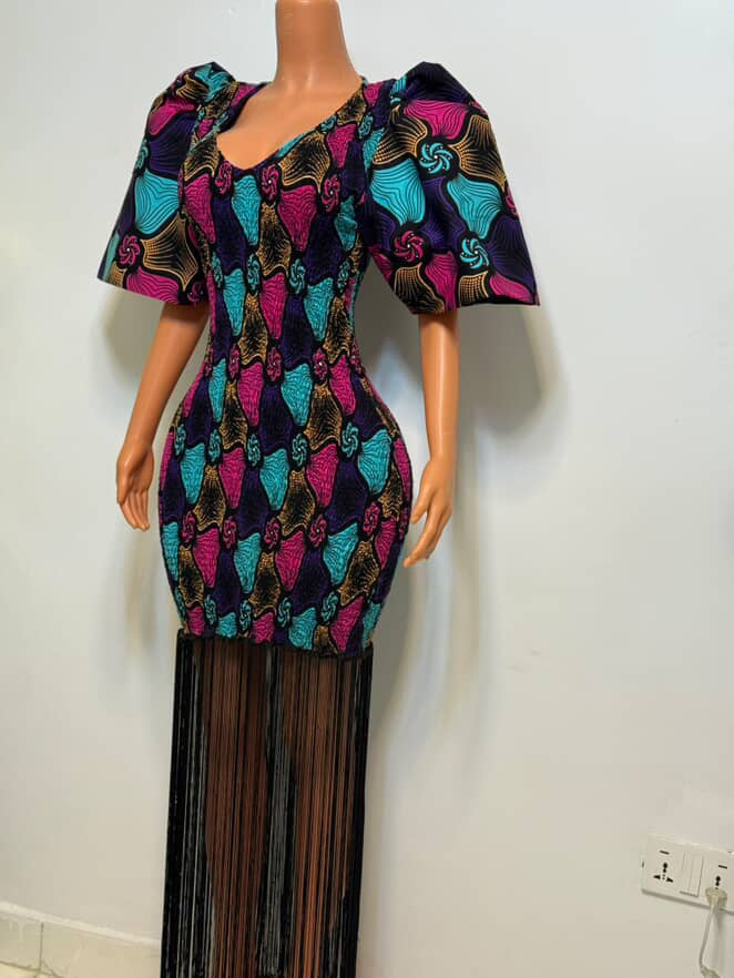 African print stretchy bodycon dress with dripping fringe.