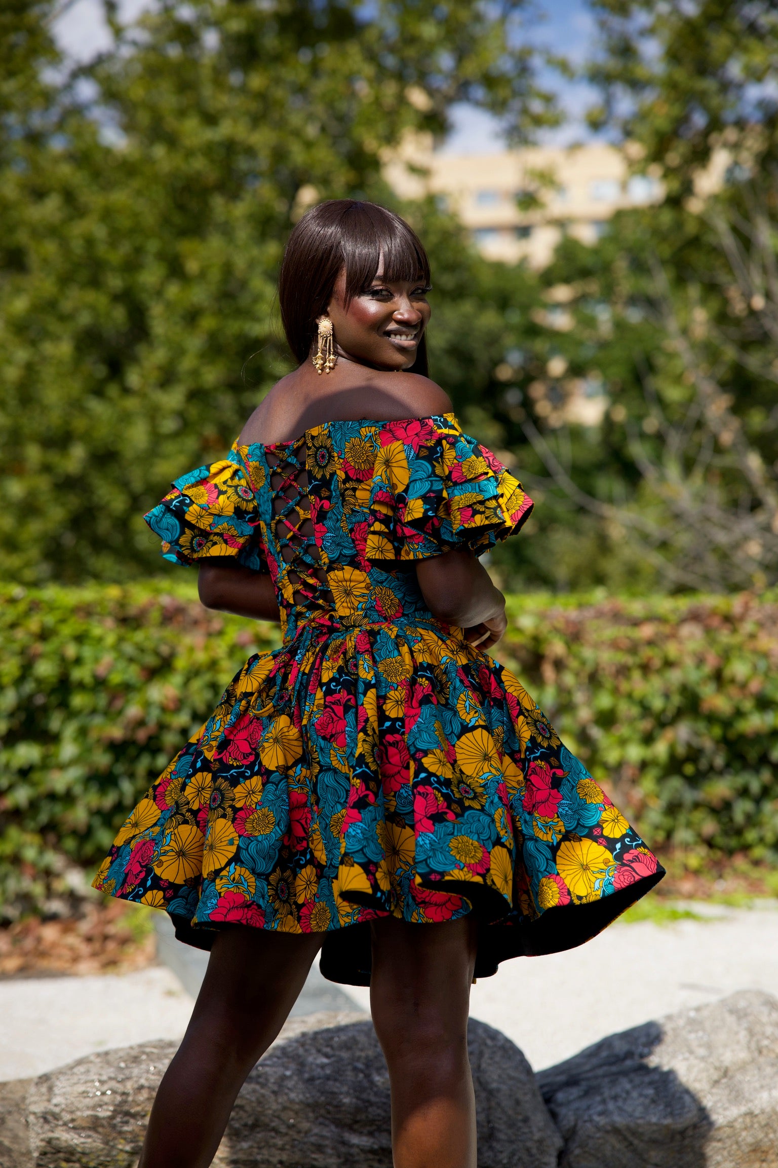Short African print peplum skirt with dramatic sleeves corset top Short African print peplum skirt with dramatic sleeves corset top